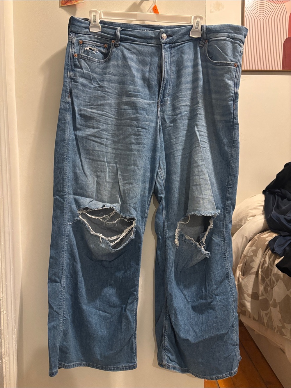 American Eagle Outfitters Light Blue wide legged Ripped Jeans